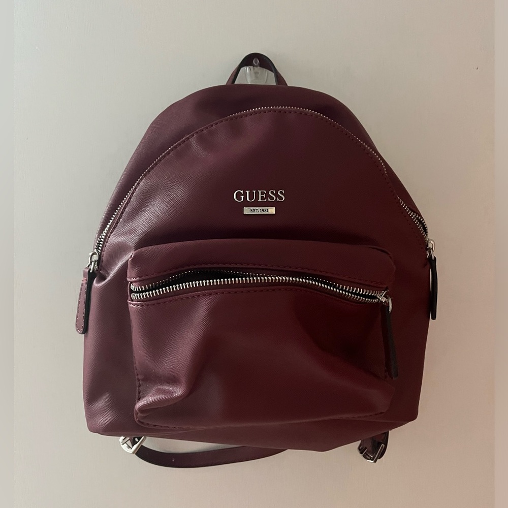 Maroon GUESS backpack purse, never used.